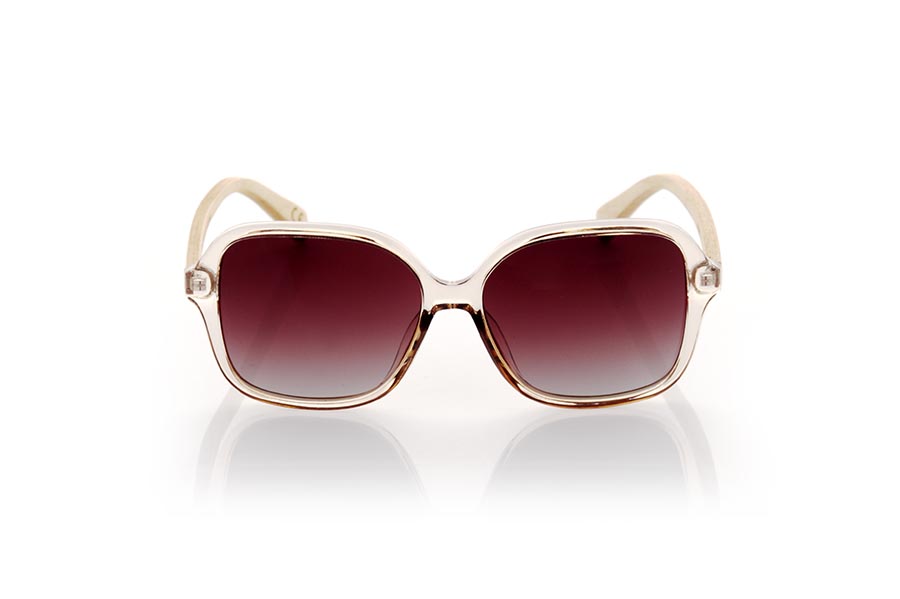 Gafas de Madera Natural de Arce ARIANE. Las gafas de sol ARIANE son perfectas para las mujeres que buscan un estilo sofisticado y moderno. Con una montura cuadrada en un tono champagne transparente brillante y un tamaño ligeramente sobredimensionado, estas gafas de sol destacarán en cualquier outfit. Las varillas de madera de arce en tonos claros combinan a la perfección con la montura y añaden un toque de elegancia y sostenibilidad. Las lentes marrones gradient polarizadas protegen tus ojos de los rayos UV y le dan un aspecto clásico a estas gafas de sol de última tendencia. Medida frontal aprox : 146x56mm Calibre: 55 Venta al Por Mayor y Detalle | Root Sunglasses® 